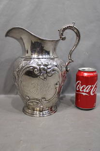 Great J. E. Caldwell sterling silver water pitcher (20.39 ozt). Very fancy, real nice. 6 pts,: Great J. E. Caldwell sterling silver water pitcher (20.39 ozt). Very fancy, real nice. 6 pts, Harrison estate Philadelphia PA. 10" tall.