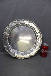 Awesome 14" sterling silver tray by J. E. Caldwell & Co. 35 ozt from the Harrison estate (prominent: Awesome 14" sterling silver tray by J. E. Caldwell & Co. 35 ozt from the Harrison estate (prominent Philadelphia estate). 35.21 ozt. Has the family crest in nice condition.