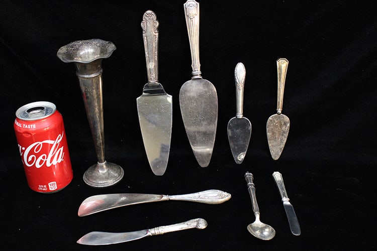 9 pieces of weighted sterling incl. shoe horn and sterling pieces. Needs polishing, largest is 10". (1 of 3)