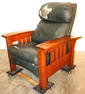 Signed Stickley contemporary bow arm recliner. All wood is in nice condition. Needs reupholstering.