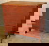Early 1 drawer lift blanket chest in old red with rose head nails. Snipe hinges, cut out end, and