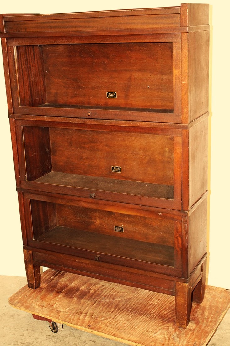 3 section mahogany "Hale" stacking bookcase in original finish. Missing piece of molding and 1 pull (1 of 3)