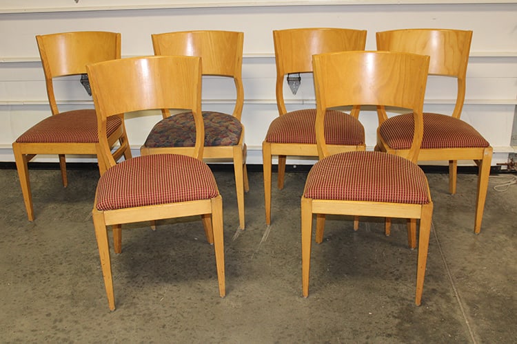 Set of 6 signed Loewen Stein chairs with laminated backs in original finish. (1) seat has different: Set of 6 signed Loewen Stein chairs with laminated backs in original finish. (1) seat has different upholstery. 18" wide, 34" tall, 20" deep.
