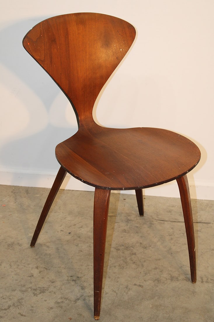 Signed ply craft mid century chair by Norman Cherner. Original finish, some small dots of paint: Signed ply craft mid century chair by Norman Cherner. Original finish, some small dots of paint (easily removed), wear consistent with age. 17" wide, 32" tall, 20" deep.