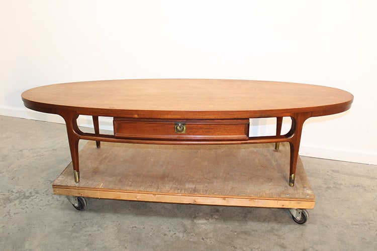 Great mid century modern surf board coffee table, has a drawer. Nice condition. 62" wide, 15" tall, (1 of 3)