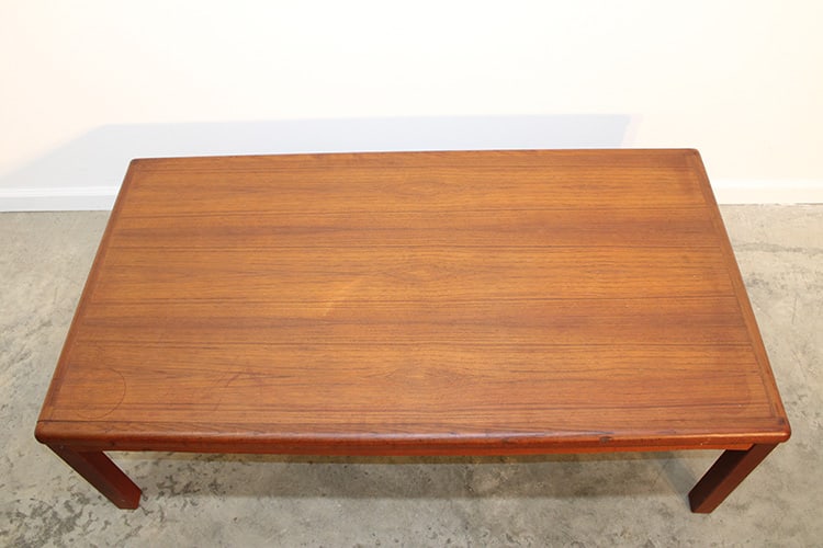 Teak coffee table marked Hornbaek Mobel Fabrik. Made in Denmark. Usual wear, consistent with age.: Teak coffee table marked Hornbaek Mobel Fabrik. Made in Denmark. Usual wear, consistent with age.