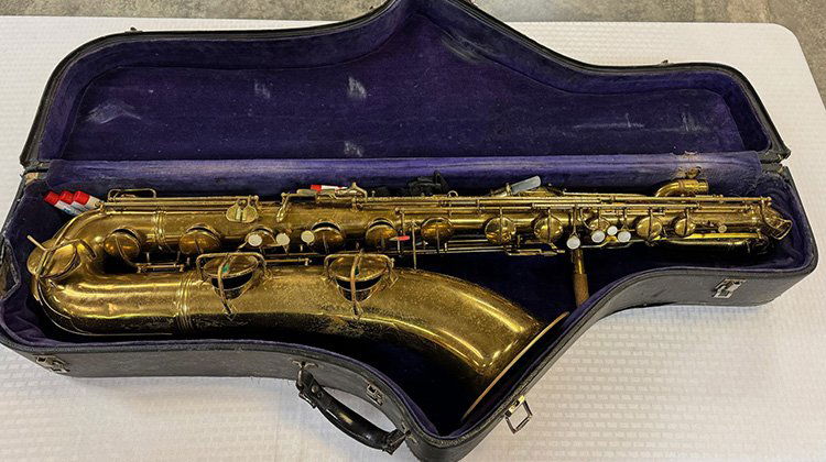 Large 40 inch con saxophone with the original case. (1 of 10)