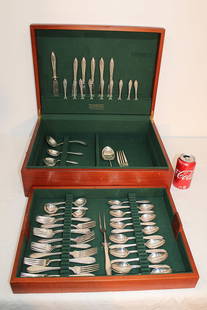 71 Piece Sterling Silver Flatware Set 62 ozt: 71 piece sterling silver flatware set 62 ozt plus 7 weighted pieces monogramed with an A. All in a finely crafted box.