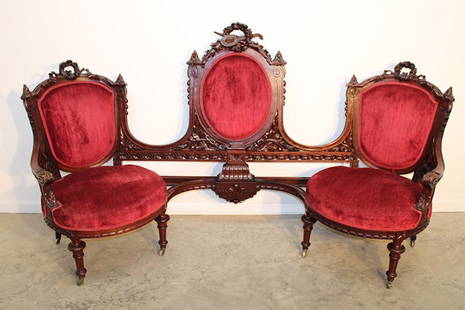 The Most Unusual Double Sofa With Carved Instrument Back: The most unusual double sofa with carved instrument back. Large wreaths and all over carving. Very sturdy, looks like it had a support put on the back years ago (nicely done - see photo). 86" wide, 48