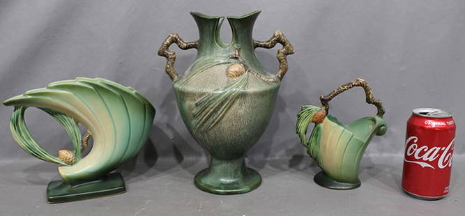 3 Pieces Of Pine Cone Roseville Vases: 3 pieces of pine cone Roseville vases all in nice condition. Tallest is 10" in green.