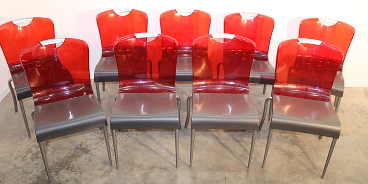Set Of 9 Mid Century Style Grosfillex Chair With Transparent Red Backs: Set of 9 mid century style grosfillex chair with transparent red backs. Some seats have scratched, consistent with age. 18" wide, 32" tall, 21" deep.
