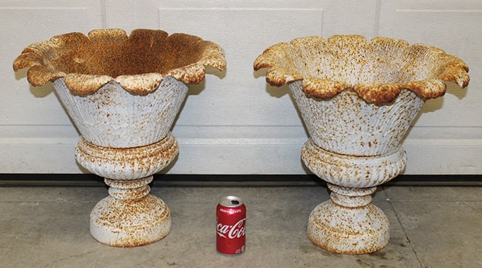 Pair Of Cast Iron Tulip Shaped Urns: Pair of cast iron tulip shaped urns in nice condition with old paint. 18" wide, 17" tall.