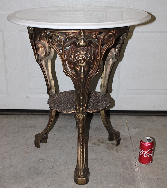 Super Marble Table With Large Women Faces All Around (1 of 5)