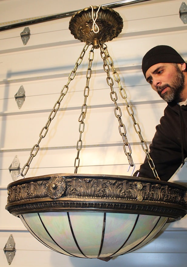 Huge Bronze Hanging Light With Leaded Dome Shade: Huge bronze hanging light with leaded dome shade. Has replaced chains and needs clips to hold the dome on. 29" wide, 46" tall.