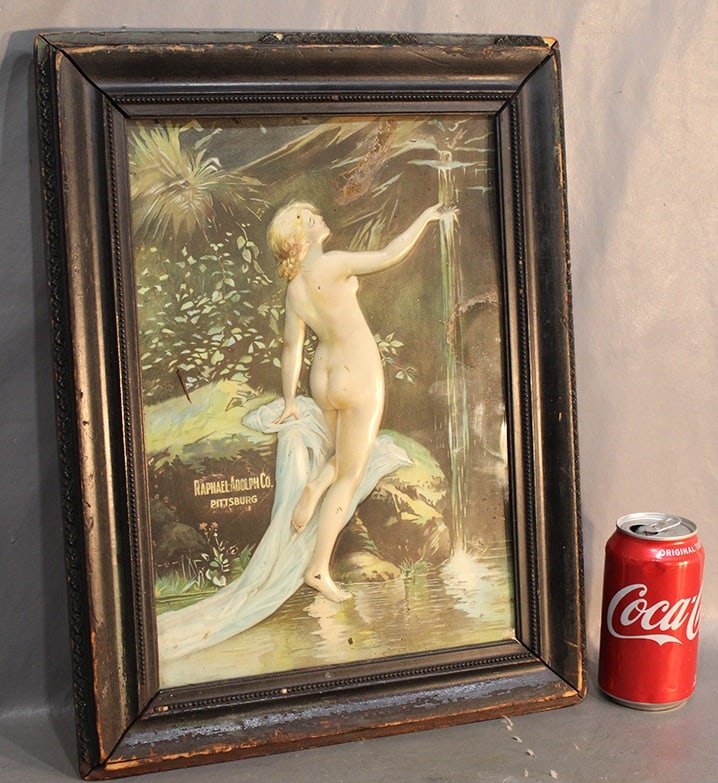 Rare Tin Raphael Adolph Tin Ad Sign, Has An Embossed Nude (Whiskey And Rye): Rare tin Raphael Adolph tin ad sign, has an embossed nude (whiskey and rye). Very nice condition, estate fresh, 13" wide, 17" tall.