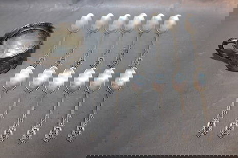 13 Pieces Of Sterling 3.6 Ozt: 13 pieces of sterling 3.6 ozt. Spoons and cup (cup as is).