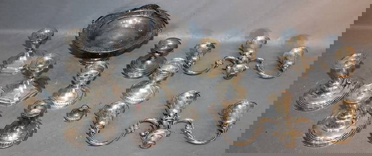12 Pieces Of Weighted Sterling: 12 pieces of weighted sterling including 3 pairs of candlesticks, handled bowl, candelabra tops.