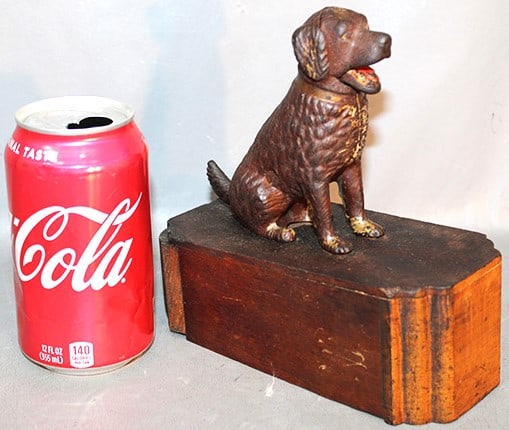 Rare Antique Mechanical Dog Cigar Cutter: Rare antique mechanical dog cigar cutter. Retains some of the original paint, estate fresh. Pushes its tail down and closes its mouth. 4" wide, 7" tall, 6" deep.