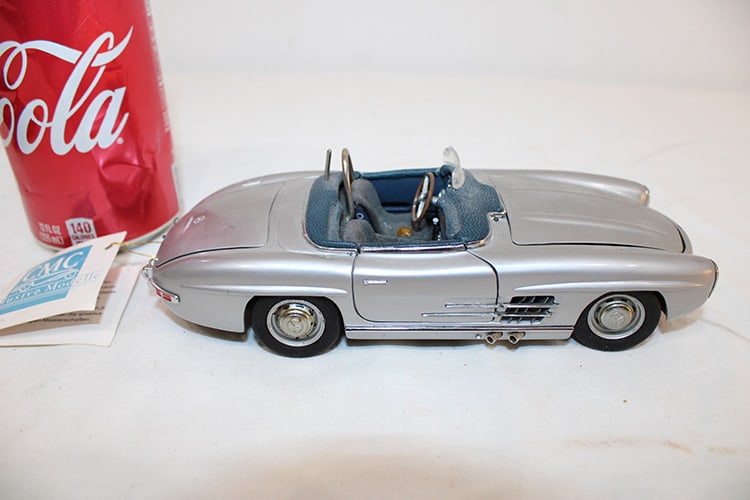 1957 Mercedes Benz 300 SL Roadster: 1957 Mercedes Benz 300 SL roadster with original tag. Moving parts to scale. Nice condition. Private collection.