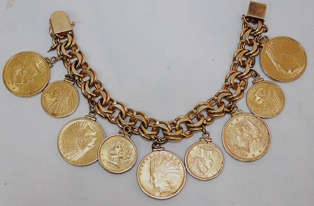 Monumental heavy 14k gold bracelet with 9 gold coins (5) $10, (4) $5, 120.7 dwt. Ten dollars are (1 of 8)