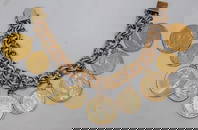 Monumental heavy 14k gold bracelet with 9 gold coins (5) $10, (4) $5, 120.7 dwt. Ten dollars are