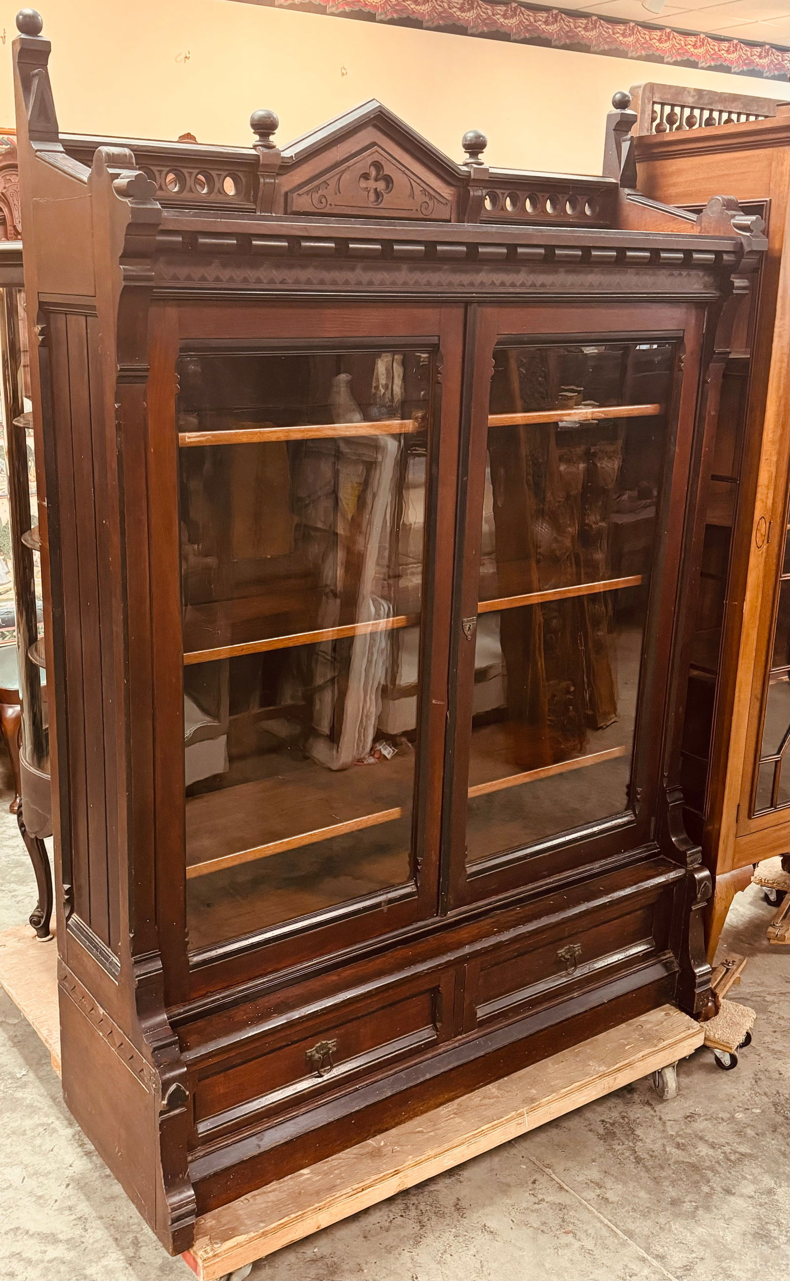 Walnut Victorian 2 door bookcase with black trim. 3 adjustable shelves gothics carved crest. 52" (1 of 4)