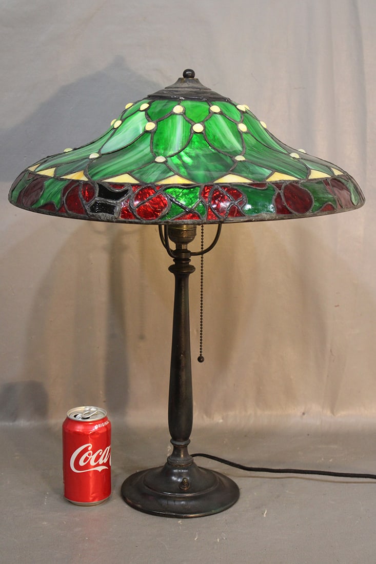 Antique multi colored leaded table lamp with jewels. Nice greens and reds. Has a few lines in the (1 of 4)