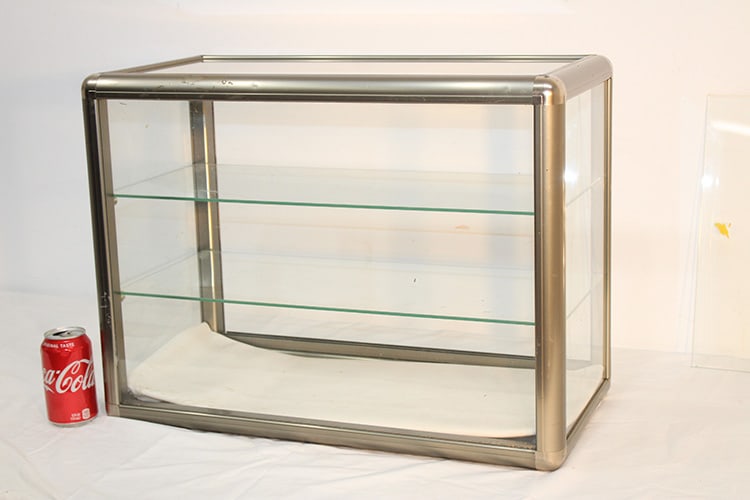 Small countertop display case. 2 shelves, original doors. Needs the bearing in the bottom or just (1 of 3)