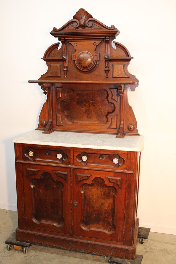 Cute 41" wide Victorian marble top sideboard with carved crest and burled bulls eye. Burled panels (1 of 6)