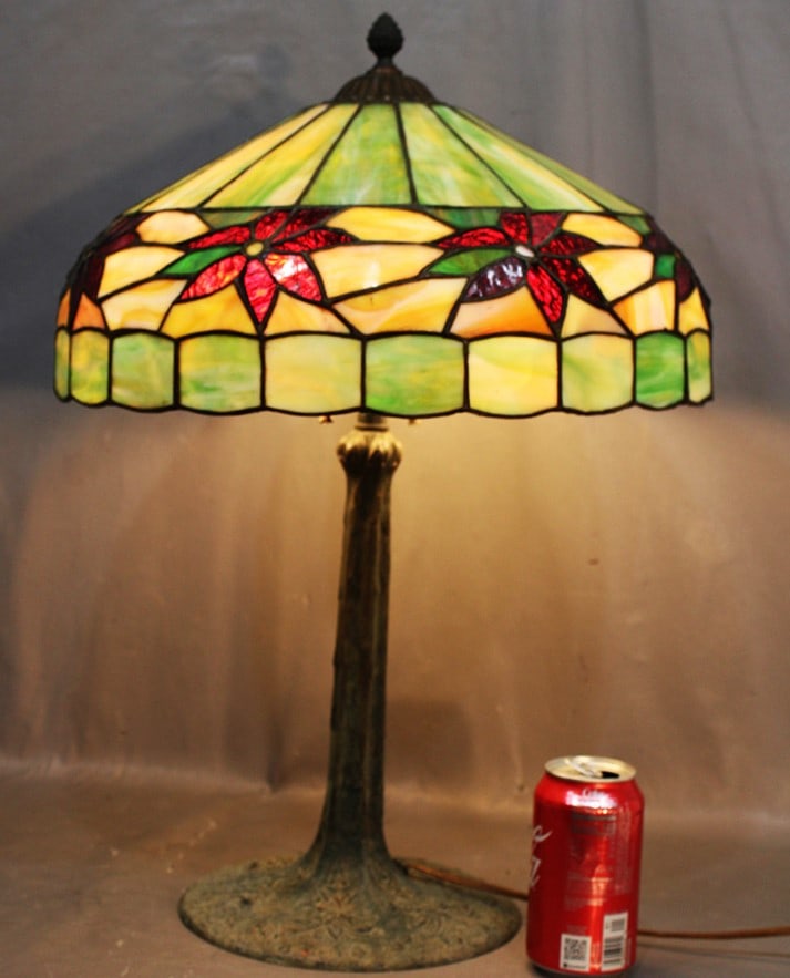 Antique leaded "Poinsettia" table lamp in nice condition. Very pretty, reds, greens, etc. Has a (1 of 3)