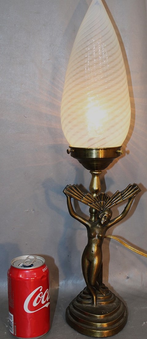 Art Deco figural nude lamp signed Chandler. Has an opalescent swirl shade and original patina. Shade: Art Deco figural nude lamp signed Chandler. Has an opalescent swirl shade and original patina. Shade has no chips or cracks. 22" tall.