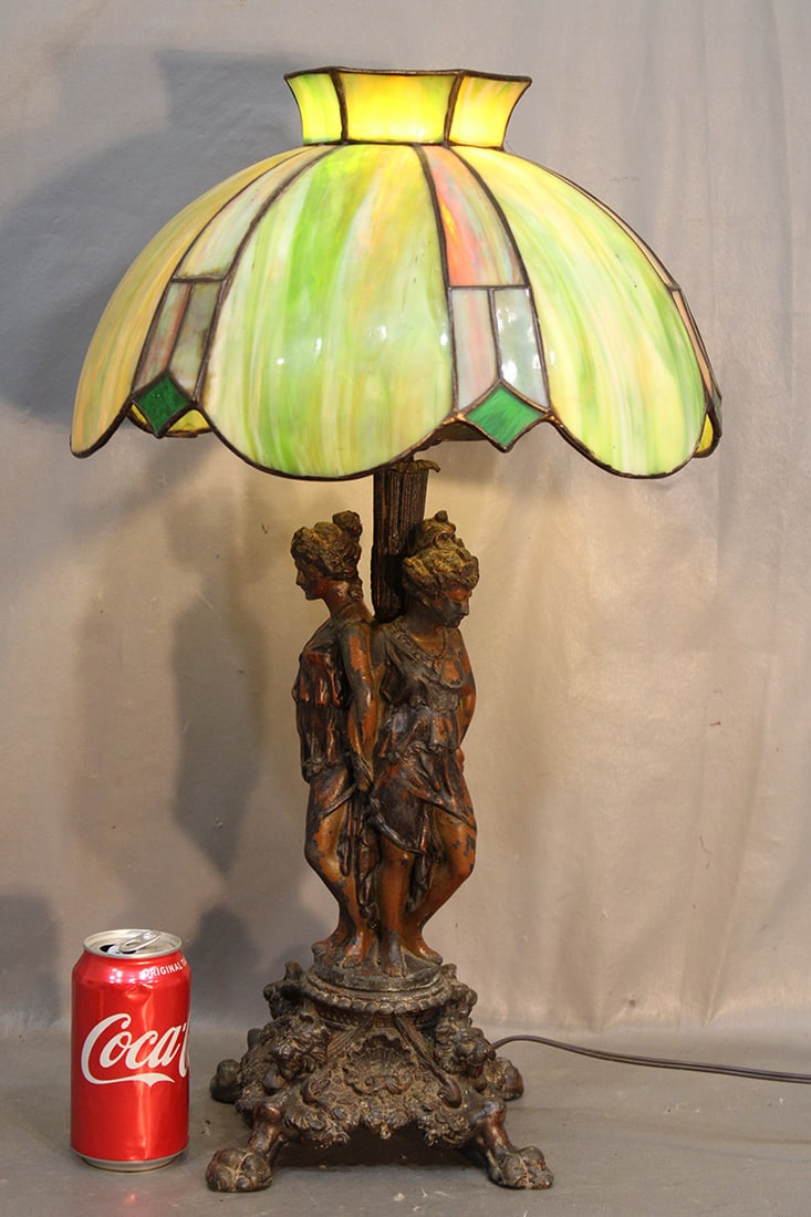 Antique leaded table lamp with 3 grace base. Base has 3 nouveau women and lions with claw feet. (1 of 5)