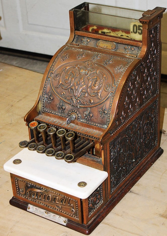 One of the sweetest National #215 candy store cash register. Has a nice copper color. Missing a (1 of 4)