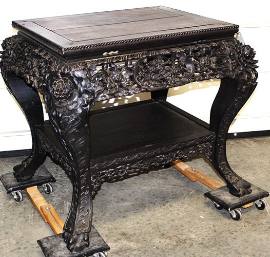 Antique 19th C. rosewood oriental table with bird and floral carvings, claw feet. Missing a small (1 of 7)