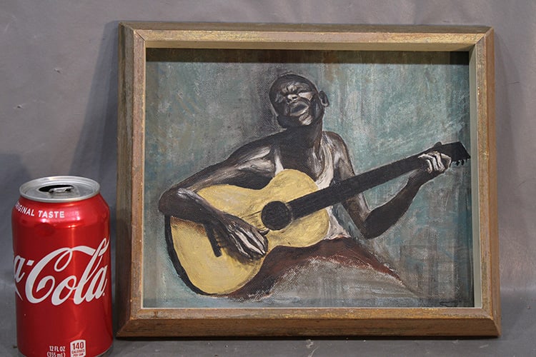 Folky painting of a black man playing a guitar titled "The Blues Singer" S. Templin? 61 on the back. (1 of 3)
