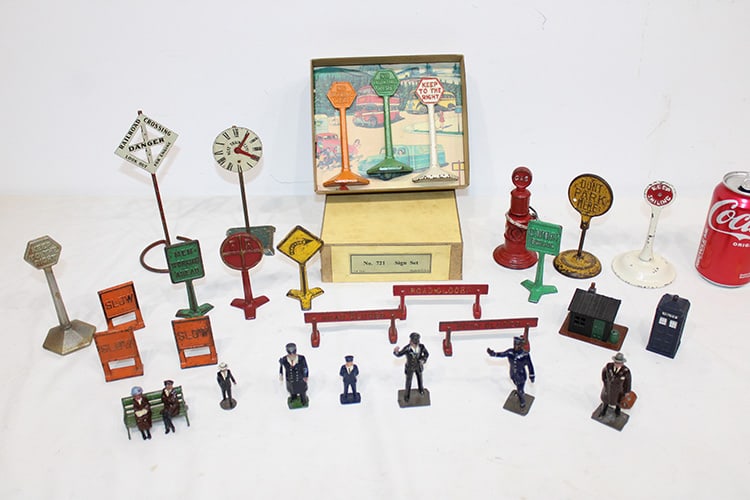Fabulous collection of iron and lead signed, people, etc. Gas pump, #721 sign set in box, lead train: Fabulous collection of iron and lead signed, people, etc. Gas pump, #721 sign set in box, lead train attendants, etc. Private collection (deceased).
