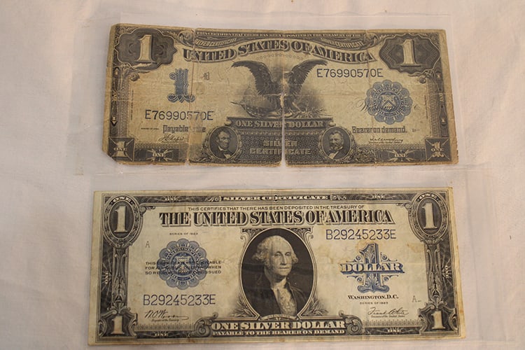 1899 And 1923 Large $1 Silver Certificates: 1899 and 1923 large $1 silver certificates. 1899 has wear and tear in it. The 1923 has some browning. No rips on either. Estate fresh.