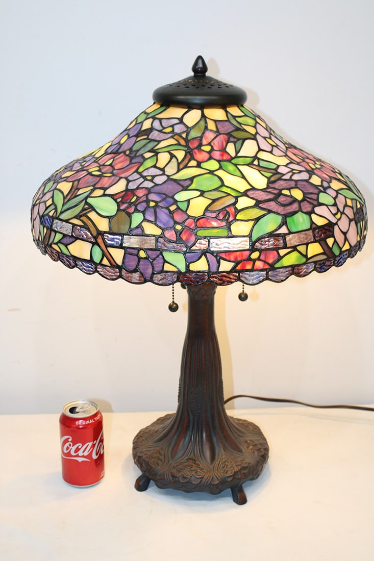 Very Pretty Tiffany Style Lamp From The Late 20Th C.: Very pretty Tiffany style lamp from the late 20th C. All in nice condition, multicolored leaded glass, 3 socket base. 18" wide, 25" tall.