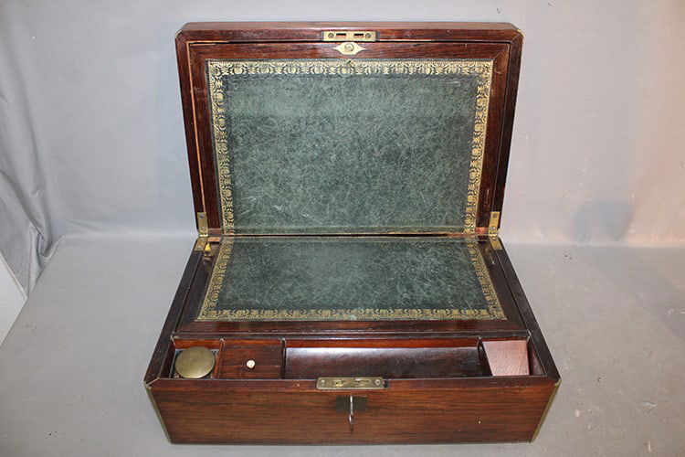 19Th C. Rosewood Campaign Desk With Brass Inlay: 19th C. rosewood campaign desk with brass inlay. Has a key (lock need adjusting), nice condition. 15" wide, 6" tall, 10" deep.