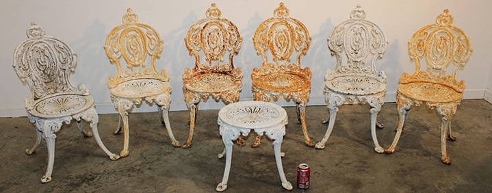 Great set of 6 cast iron garden chairs and 1 table in good condition. Needs painting. 1 chair is 18" (1 of 6)