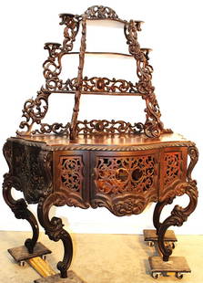 Diminutive rosewood Alexander Roux Rococo etagere. All over pierced carvings, figured maple: Diminutive rosewood Alexander Roux Rococo etagere. All over pierced carvings, figured maple interior. Missing some carvings on the back. Looks to be in original finish. 49" wide, 63" tall, 22" deep.