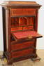 Walnut Victorian dropfront butlers desk-dresser. Fitted interior, bronze capitals on the columns,