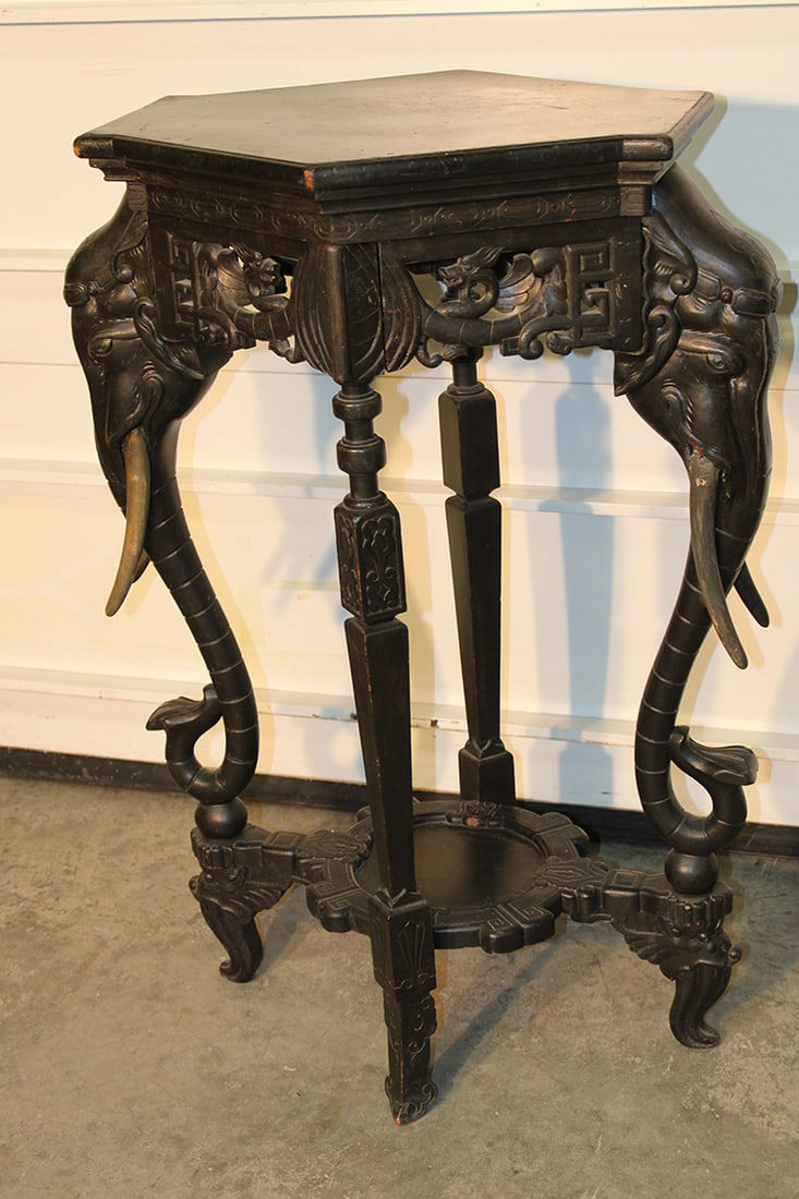 Victorian ebonized pedestal with full elephant head supports. Winged lions with an oriental motif. (1 of 5)
