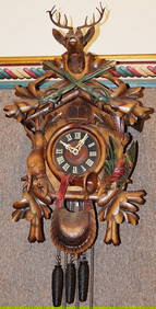 Large black forest style cuckoo clock with music box (works). 3 weights in working condition, large (1 of 5)