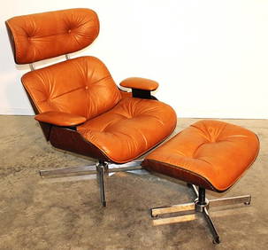 Signed Selig Eames style chair and ottoman. Nice brown leather, laminated wood in nice condition, (1 of 5)