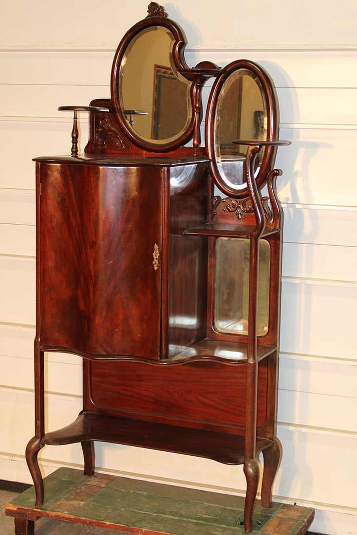 Unusual serpentene mahogany music etegere. Double mirrored back and adjustable shelves in original (1 of 4)