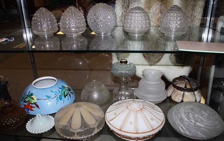 Group of antique lamp shades and parts including oil lamp. (1 of 4)