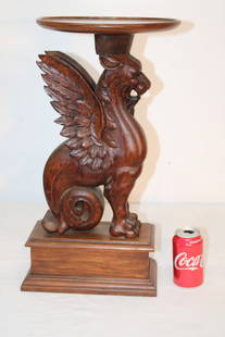 Heavily Carved Oak Winged Lion Plant Stand: Heavily carved oak winged lion plant stand. Antique lion support made into a plant stand (real nice job). Estate fresh in nice condition. 11" wide, 22" tall, 11" deep.