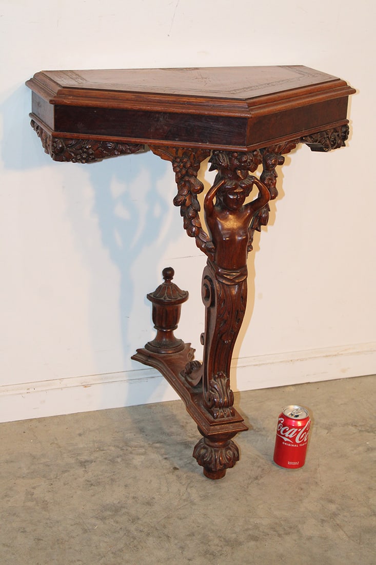Super Signed Flint And Horner Figural Semi Nude Console Table: Super signed Flint and Horner figural semi nude console table. Inlaid top original finish, mounts to the wall, heavily carved. 24" wide, 30" tall, 14" deep.