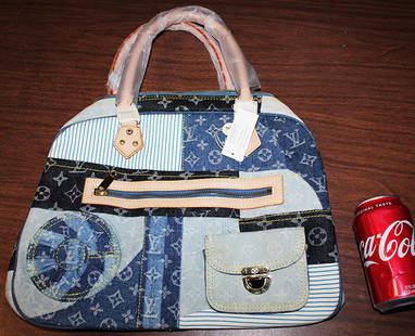 Louis Vuitton Denim Patchwork Bag (Never Used): Louis Vuitton denim patchwork bag (never used). Has the original wrapping on the handles and original tag. Estate fresh and real nice. 15" wide, 18" tall.